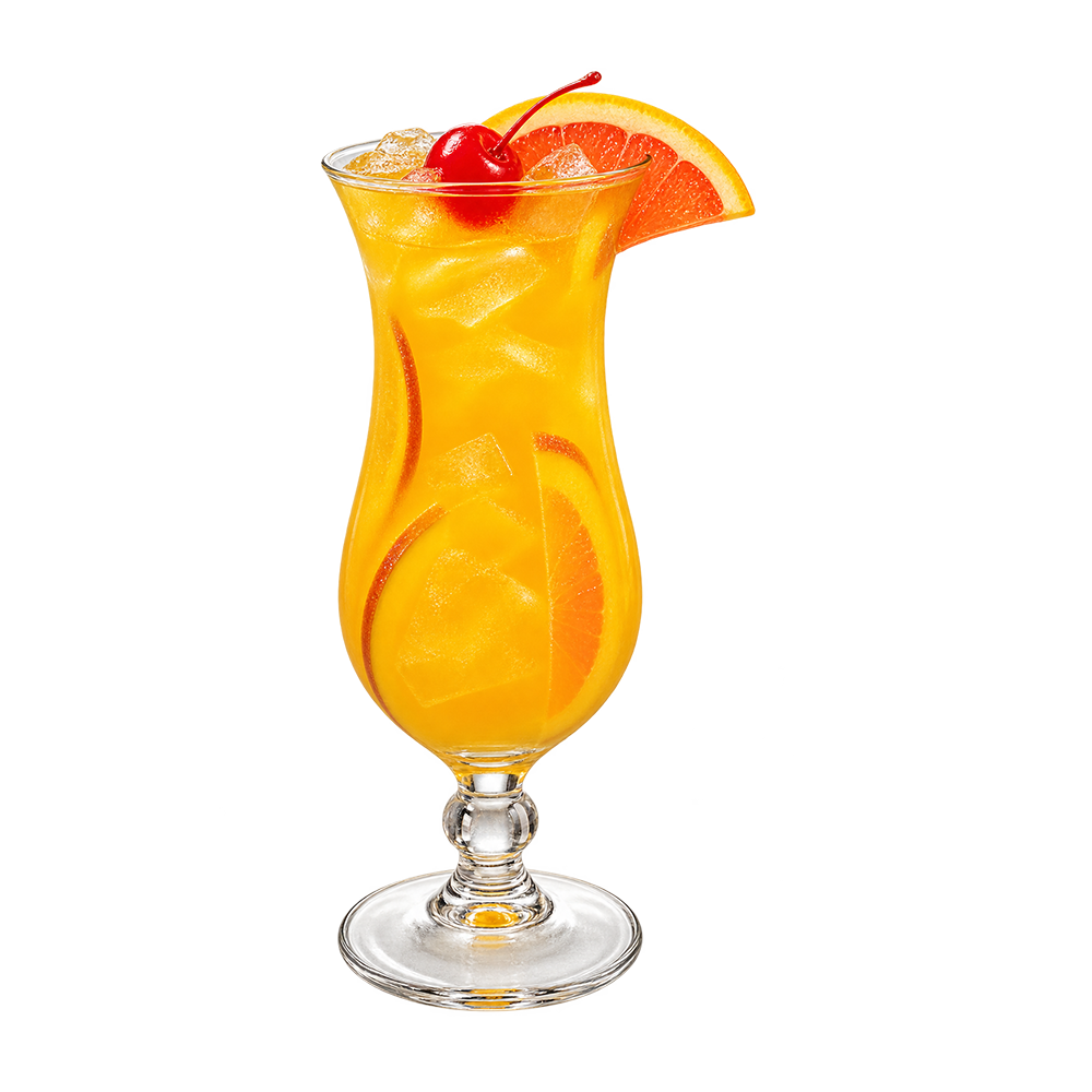 A bright yellow-orange cocktail with ice is served in a tall curved hurricane glass and garnished with orange slices and a red cherry.