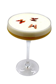 Coupe glass with yellow drink white foam butterfly garnishes plain background