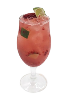 Goblet glass with pink iced drink lime wedge raspberries plain background