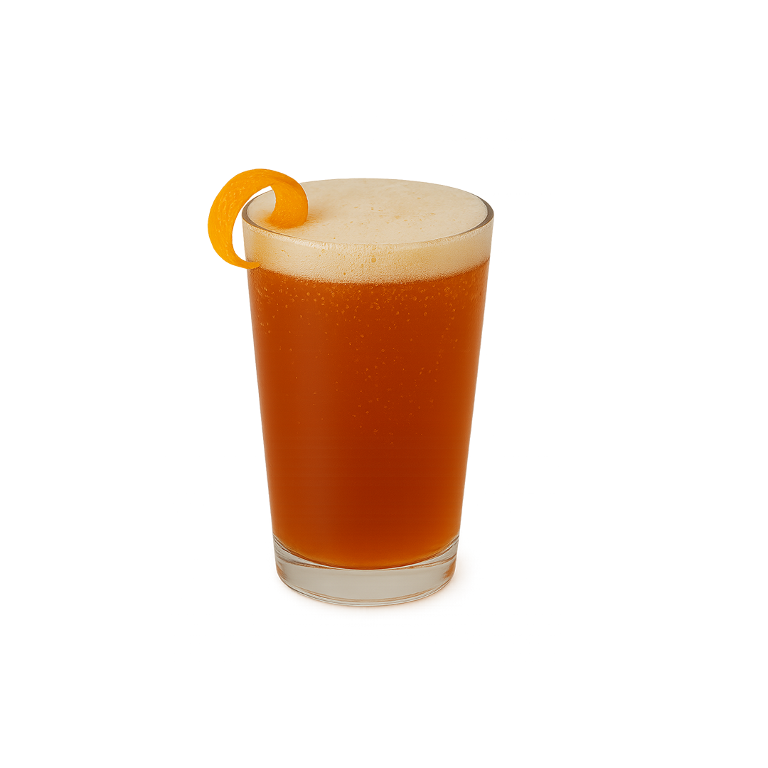 Orange drink with creamy foam and orange peel garnish in a glass