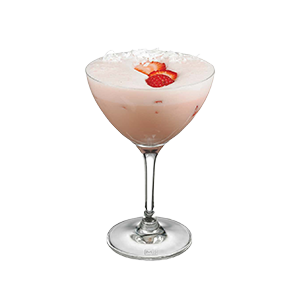 A pale pink cocktail is served in a coupe glass with a light foamy top and garnished with a sliced strawberry.