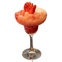 Margarita glass with red frozen drink strawberry slices bar background