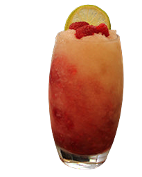 Highball glass with layered red and yellow frozen drink lime wheel raspberries bar background