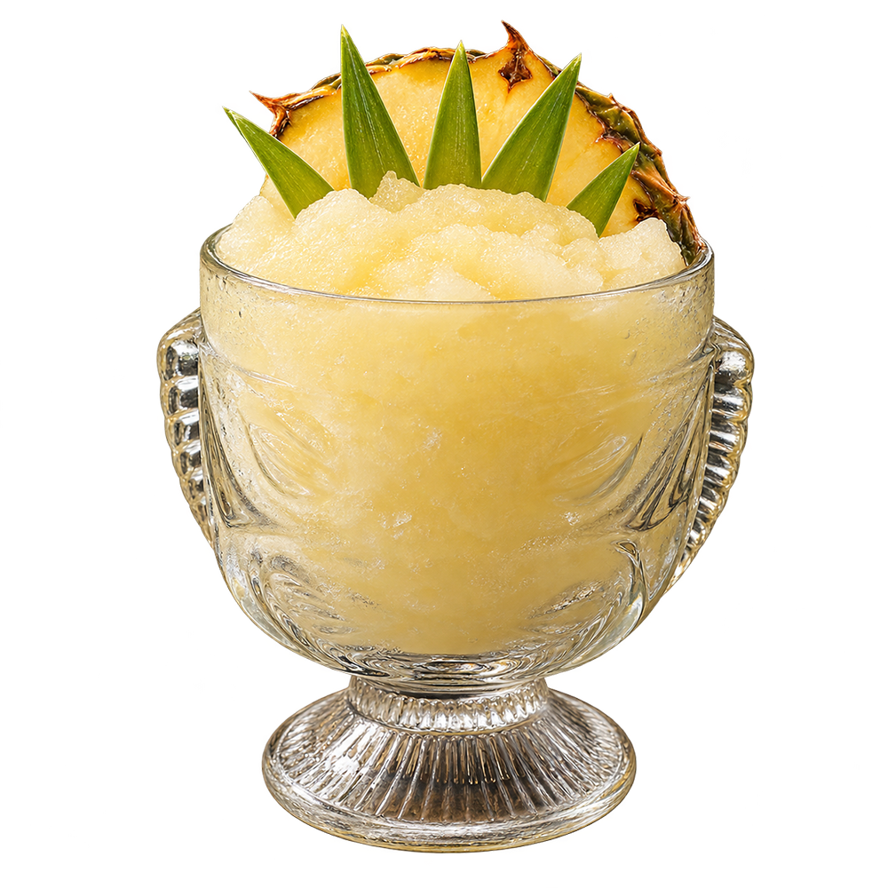 Tiki glass with yellow slush drink pineapple wedge leaves bar background