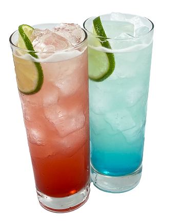 Two tall cocktails are shown side by side with ice and lime slices. The left drink is pink with a darker red layer near the bottom, while the right drink is light blue with a darker blue layer at the bottom